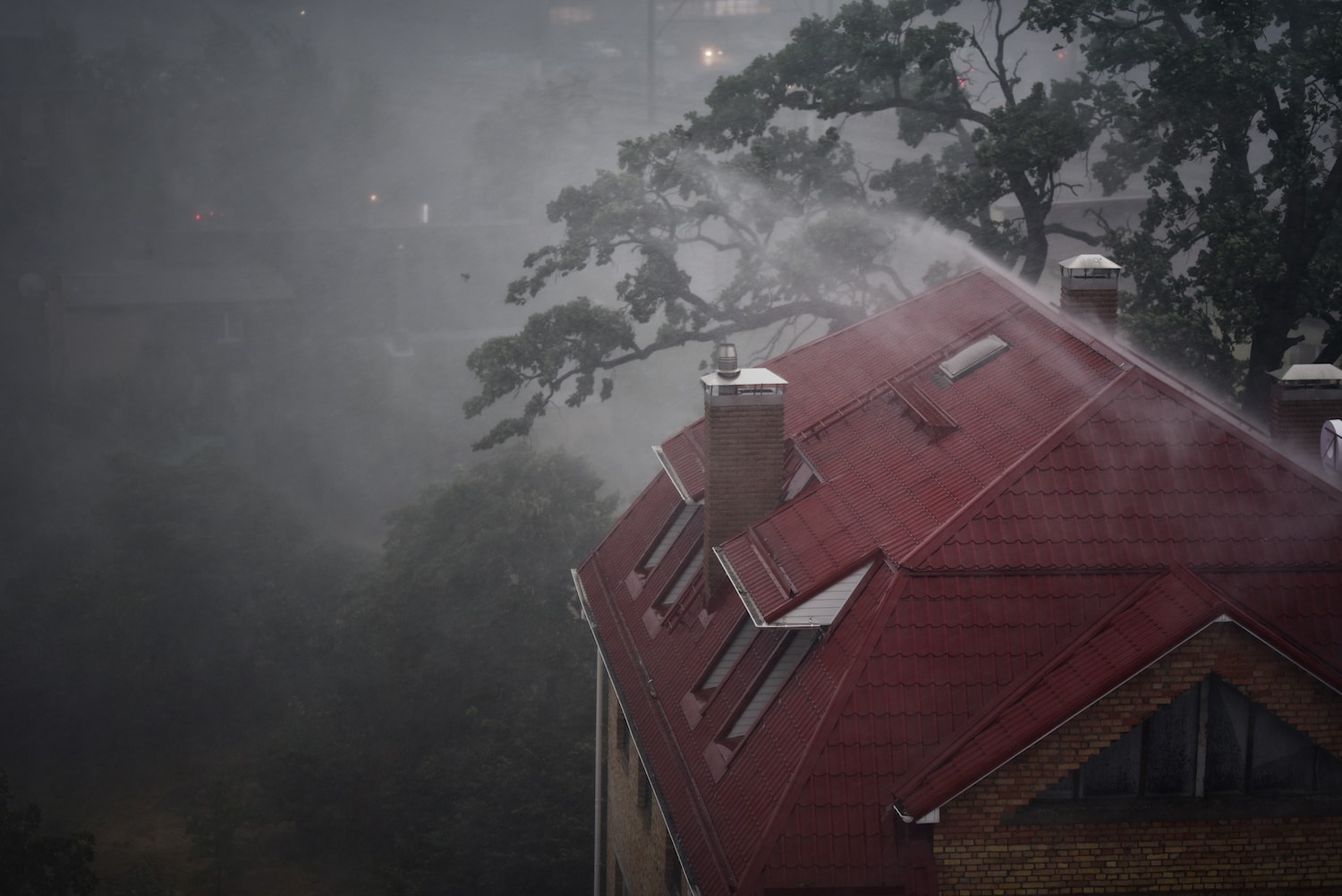 heavy rain with a stormy wind on roof during hurricane ian
