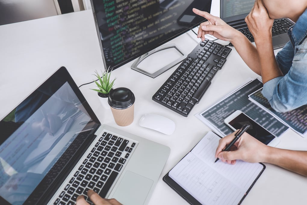 team working to fix an error 404 message