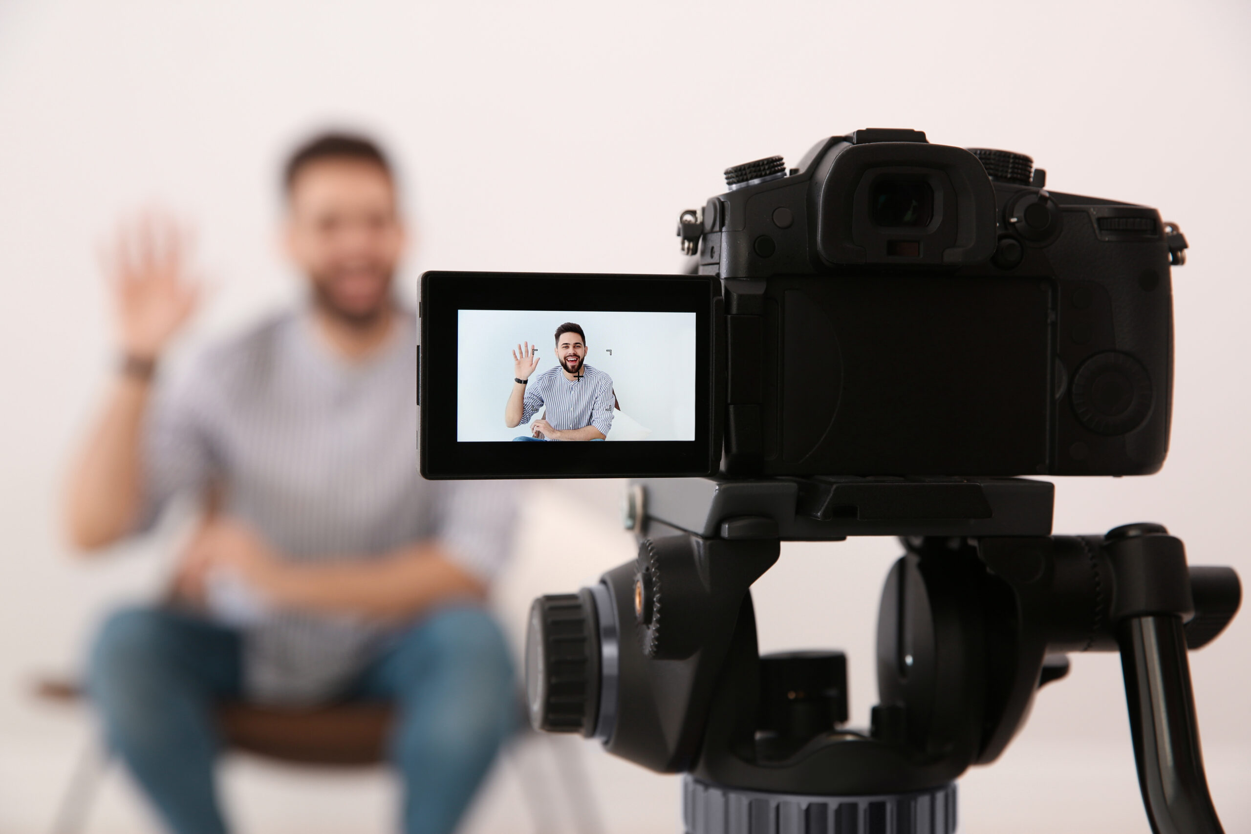man filming roofing youtube video