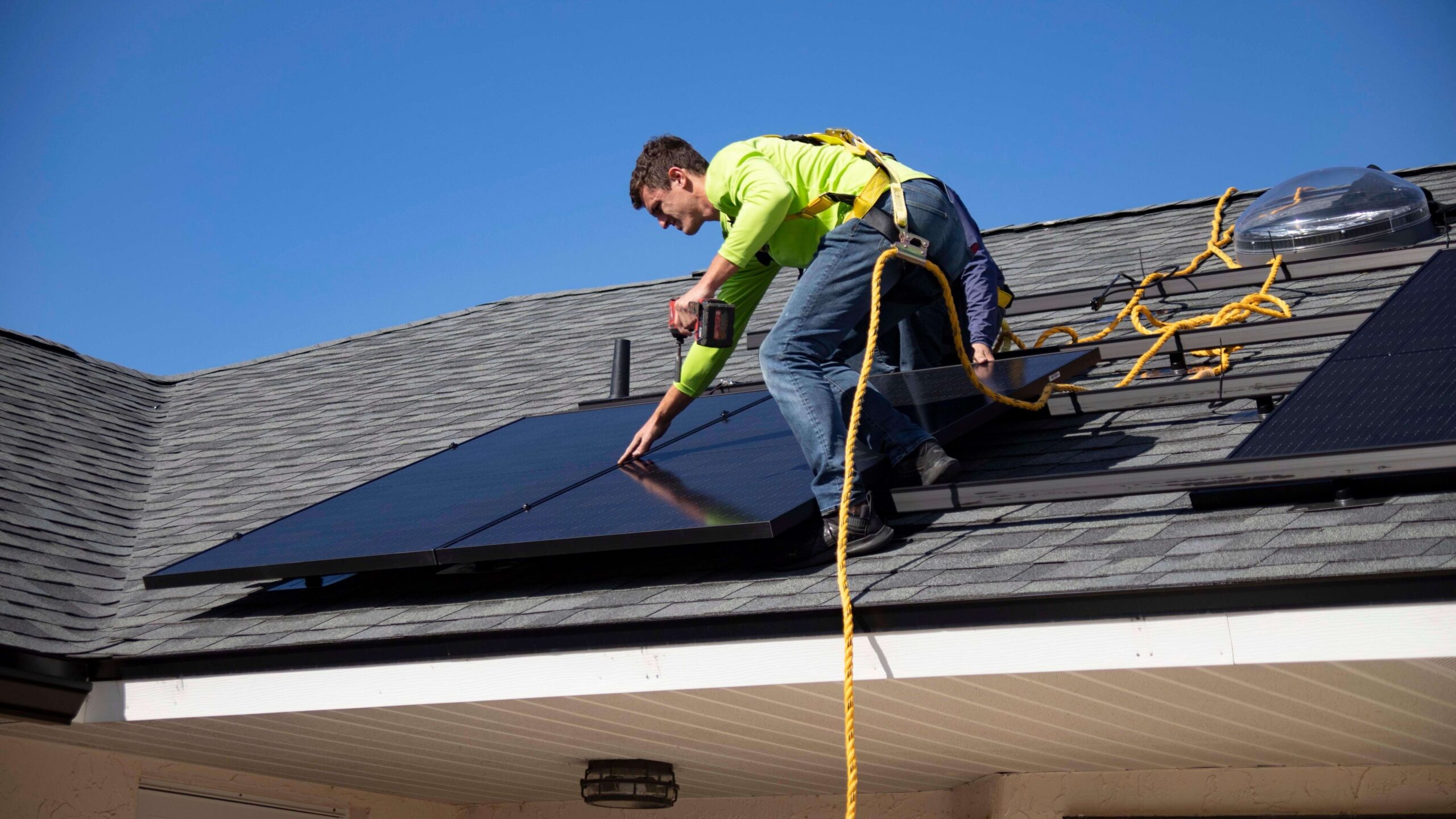 residential electricians installing solar panels