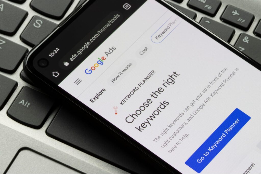 Google Ads Keyword Planner’s "Choose the right keywords" feature shown on a phone—essential for contractor marketing success.