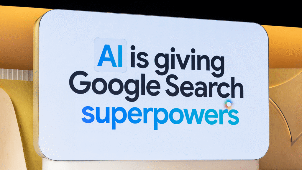 A large lit sign says, "AI is giving Google Search superpowers," with "AI" and "superpowers" in blue, on a modern curved backdrop.