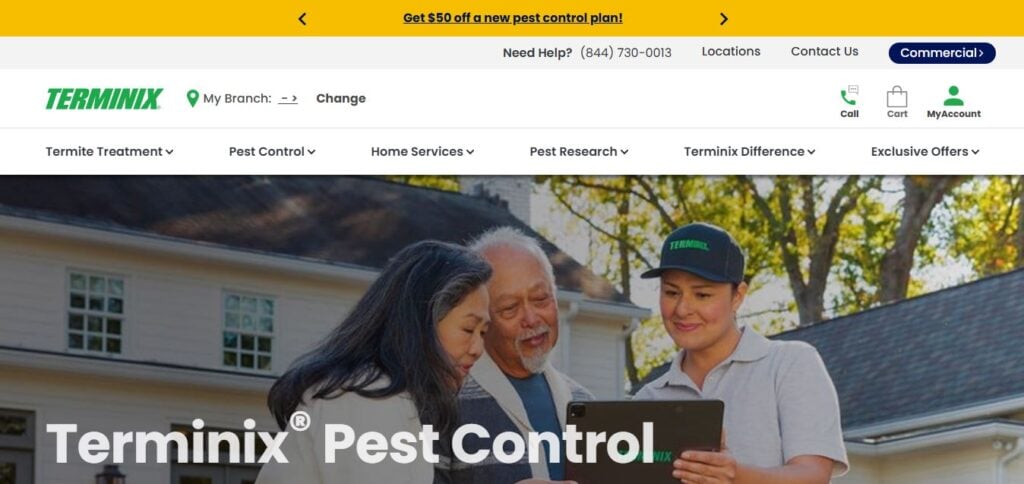 Terminix employee in uniform presents pest control options on a tablet to two customers outside, with the site menu visible.