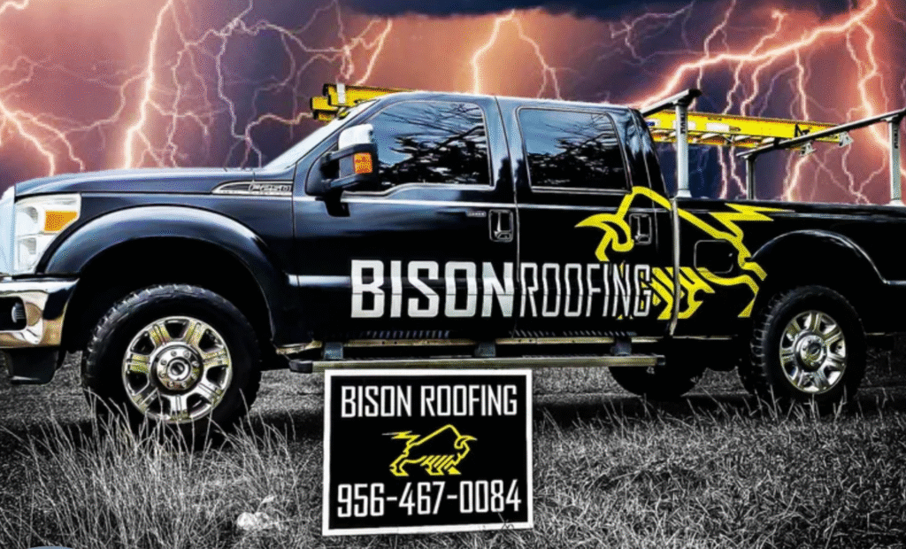 Black pickup truck with "BISON ROOFING" and yellow bison logo parked on grass, bold signage highlights effective roofing branding.