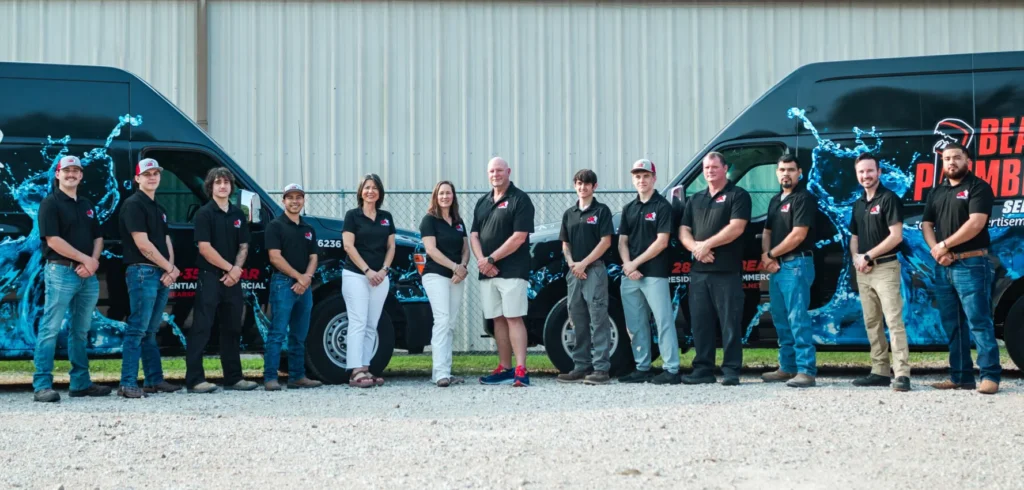Hook Agency’s expert team in branded black shirts stands by logoed vans, ready to guide you on Google vs Local Service Ads.