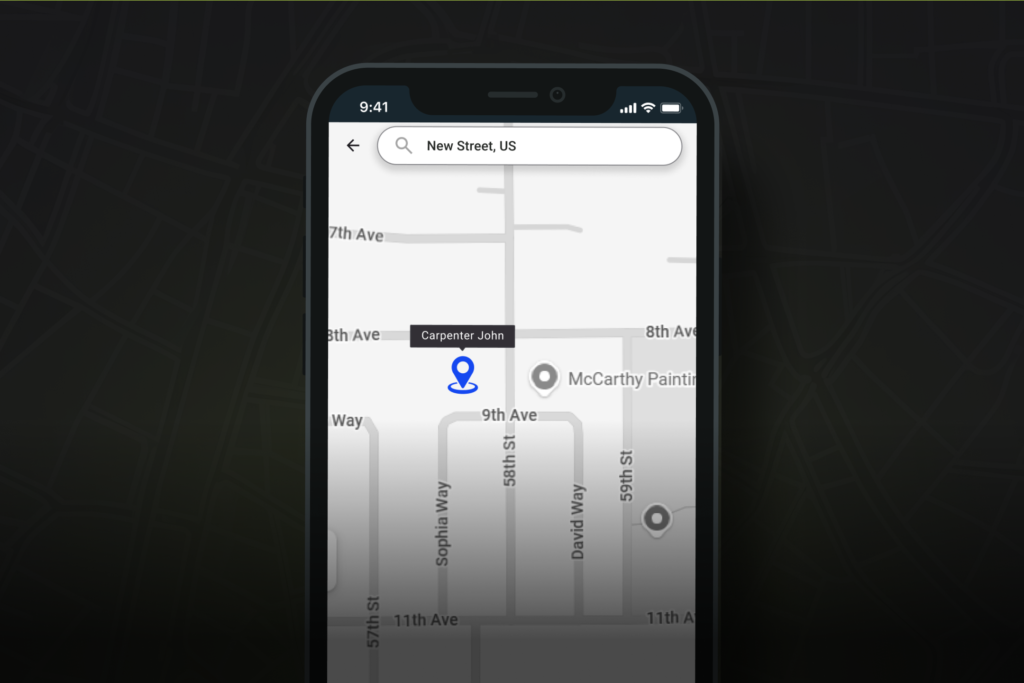 A smartphone screen shows a map with a location pin marked “Carpenter John” near 8th Ave and 59th St. Street names, nearby buildings, and a search bar labeled “New Street, US” are visible, reflecting the easy location-sharing feature featured on Hook Agency’s website.