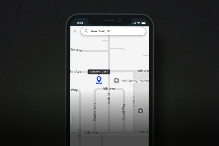 A smartphone screen shows a map with a location pin marked “Carpenter John” near 8th Ave and 59th St. Street names, nearby buildings, and a search bar labeled “New Street, US” are visible, reflecting the easy location-sharing feature featured on Hook Agency’s website.