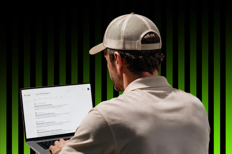 On Hook Agency’s website, a person in a beige cap and shirt types on a laptop displaying a Google search—researching contractor guides or digital marketing agency launch strategies for 2026. The scene features a black background with vertical green stripes.